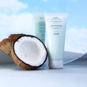 Low pH Coconut Face Wash bottle front view with coconut background